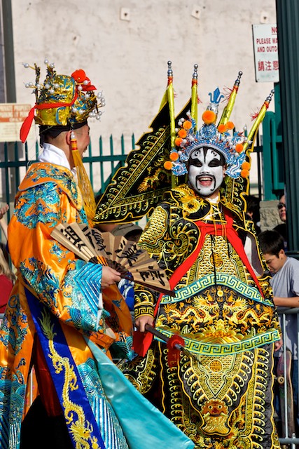 Men dress in traditional Chinese costumes for the 2011 Golden Dragon Chinese New Year Parade.