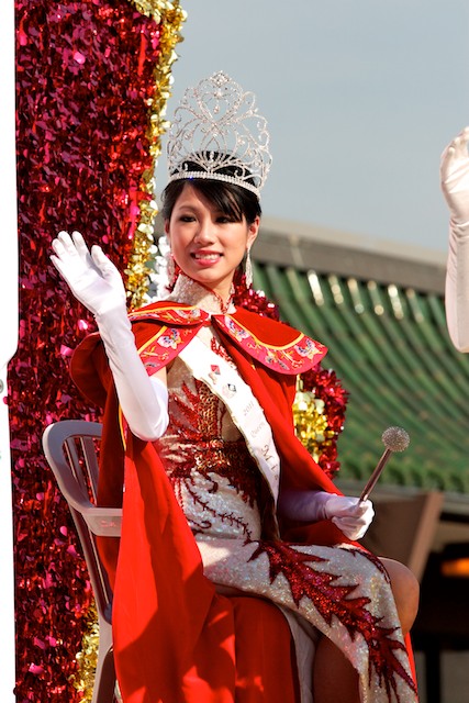 The 2011 Miss LA Chinatown Queen, Shirley Zhang, waves to the crowd from her float.