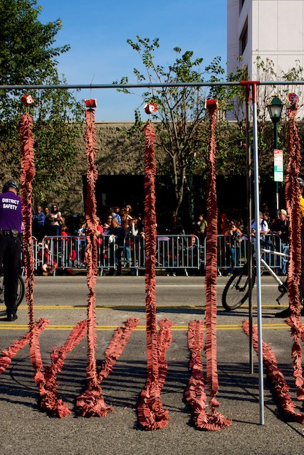 Ropes of firecrackers waiting to be lit at the closing of the 2011 Golden Dragon Chinese New Year Parade.